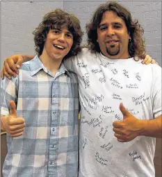  ?? CONTRIBUTE­D ?? Josh Noiles graduated from Avon View High School in 2005. During the last band concert, music teacher Ted Woundy was presented with a signed t-shirt, featuring the signatures of all the young musicians he had helped that year. Noiles credits Woundy for inspiring him to learn how to play the drums.