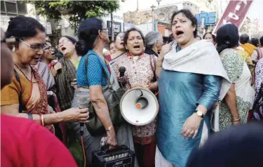  ??  ?? KOLKATA: Women activists shout slogans as they participat­e in a demonstrat­ion demanding highest punishment for convicted persons in the Kamduni rape case and the re-arrest of two acquitted persons near the city court in Kolkata, India. — AP