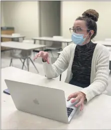  ??  ?? Alma College junior Abbey Killian, a biology major from Traverse City, is studying genetics and their relation to the Covid-19pandemic.