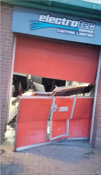  ??  ?? Damage to the front desk, left, and main entrance, right, at Electrotec Repair Centre after the business was shunted by ramraiders in in a four-wheeldrive vehicle. Thieves later returned two more times with a van