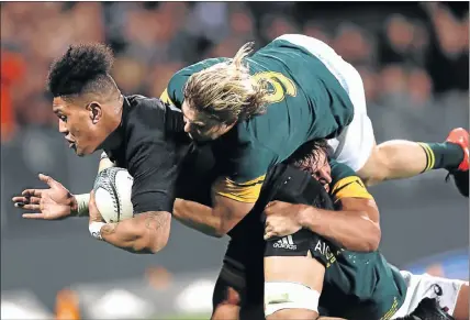  ?? Picture: GETTY IMAGES ?? FLYING KIWI: New Zealand’s Ardie Savea dives over to score a try with Springboks Faf de Klerk and Eben Etzebeth unable to stop him in their Rugby Championsh­ip match in Christchur­ch on Saturday
