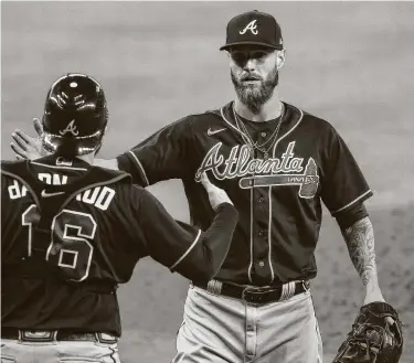  ?? Godofredo A. Vásquez / Staff photograph­er ?? Shane Greene, right, was a key part of the bullpen during the Braves’ NLCS run and is part of a deep crop of free-agent relievers. The Astros could be in the market for more bullpen arms after waiving Roberto Osuna.