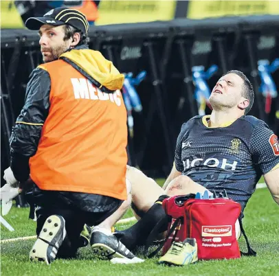  ?? Photo: GETTY IMAGES ?? Wellington second five-eighth Shaun Treeby gets treatment after being injured during last night’s 36-17 thrashing by the Tasman Makos at Westpac Stadium.