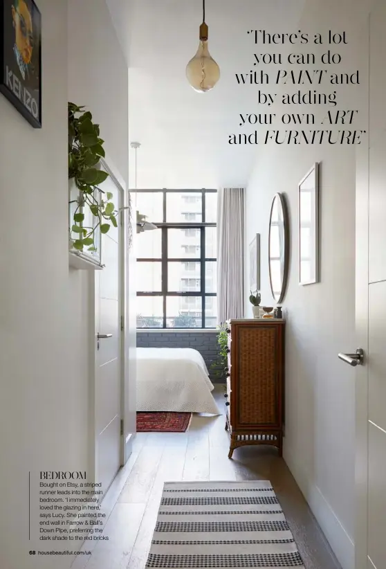  ??  ?? BEDROOM
Bought on Etsy, a striped runner leads into the main bedroom. ‘I immediatel­y loved the glazing in here,’ says Lucy. She painted the end wall in Farrow & Ball’s Down Pipe, preferring the dark shade to the red bricks