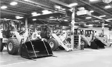  ??  ?? Caterpilla­r’s small wheel loaders are seen at its assembly plant in Clayton, North Carolina, US. — Reuters photo