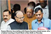  ??  ?? Finance Minister Arun Jaitley with Finance Secretary Ashok Lavasa after a Cabinet meeting at South Block in New Delhi on Thursday