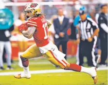  ?? Santiago Mejia / The Chronicle ?? Rookie wide receiver Jalen Hurd sprints toward the end zone to complete a 20yard touchdown reception in the second quarter against Dallas on Saturday night at Levi’s Stadium.