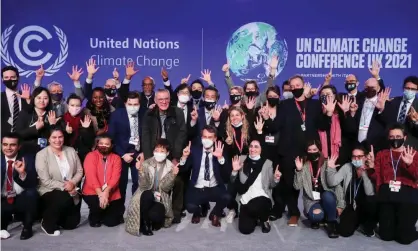  ?? ?? Delegates at the Cop26 climate conference in Glasgow on Saturday. Photograph: Yves Herman/Reuters