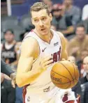  ?? RICK SCUTERI/AP ?? Goran Dragic is still with the Heat, but how long he’ll stay is a question he can’t answer at the moment.