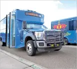  ?? NEW MEXICAN FILE PHOTOS ?? A study on Santa Fe Trails bus system, left, and the North Central Regional Transit District, right, offers a menu of options for consolidat­ing services beginning in 2018.