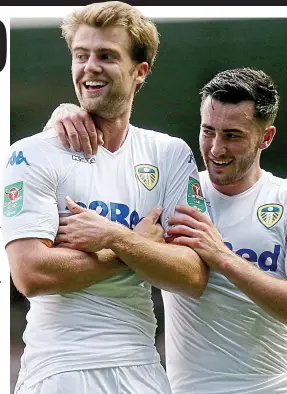  ??  ?? Debut delight: Bamford (left) celebrates his strike for Leeds REX