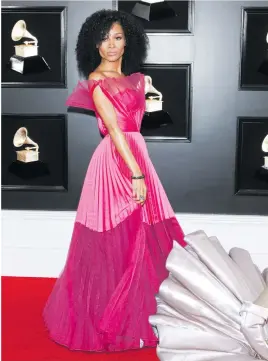  ??  ?? THINK PINK. Zuri Hall in a structured pink gown.