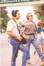  ?? COURTESY OF MARK SLIMP ?? Mark Slimp and soundman William Blanco are shown in Havana, Cuba, in the mid-1990s.