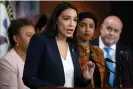  ?? Photograph: Jacquelyn Martin/AP ?? Ocasio-Cortez speaks during a news conference by the Congressio­nal Progressiv­e Caucus on the threat of default on 24 May on Capitol Hill in Washington.