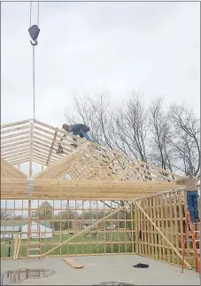  ?? COURTESY PHOTO ?? Crew members with L & M Constructi­on work on the Community Center that is under constructi­on in Goodman.