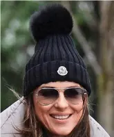  ??  ?? Liz Hurley in a Moncler beanie hat
