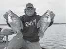  ?? SPECIAL TO THE CLARION-LEDGER ?? Hugh Krutz of Brandon holds up some of the quality crappie being caught at Barnett Reservoir and said the action should only get better.