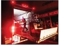  ?? (AP/Noah Berger) ?? Ray Lopez delivers supplies to Mountain Mike’s Pizza in the Montclair district of Oakland, Calif., where the power was turned off Thursday by Pacific Gas & Electric. Thousands of people in Northern California were without power as a fall heat wave raised the threat of renewed wildfires.