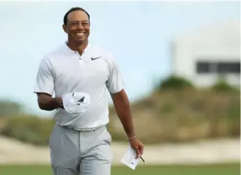  ?? MIKE EHRMANN/GETTY IMAGES FILE PHOTO ?? Tiger Woods had plenty to smile about regarding his return to competitiv­e golf at the Hero World Challenge.