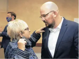  ?? MICHAEL GARD/POST-TRIBUNE ?? State Sen. Karen Tallian, left, D-Portage, speaks with her successor, Rodney Pol Jr., Gary corporatio­n counsel, after a caucus of local Democratic Party leaders Oct. 21 in Burns Harbor.