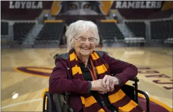  ?? JESSIE WARDARSKI — THE ASSOCIATED PRESS ?? Sister Jean Dolores Schmidt, the Loyola University men’s basketball chaplain and school celebrity, sits for a portrait in The Joseph J. Gentile Arena, on Jan. 23in Chicago. The beloved Catholic nun captured the world’s imaginatio­n and became something of a folk hero while supporting the Ramblers at the NCAA Final Four in 2018.