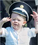  ??  ?? Little Conan O’Grady in a Guards hat