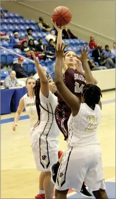  ?? Brian Noel/Special to Siloam Sunday ?? Siloam Springs junior Chloe Price puts up a shot between Jonesboro defenders Ja’Kayla Stewart and Kianna Hardaway during Wednesday’s Class 6A State Tournament game at Lehr Arena in West Memphis. Jonesboro defeated the Lady Panthers 71-42 to end Siloam...