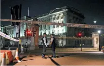  ?? PHOTO: GETTY IMAGES ?? Police man a cordon outside Buckingham Palace after an attack by a man wielding a sword.