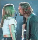  ?? CLAY ENOS ?? Ally (Lady Gaga) and Jackson Maine (Bradley Cooper) wow an audience in “A Star Is Born.”