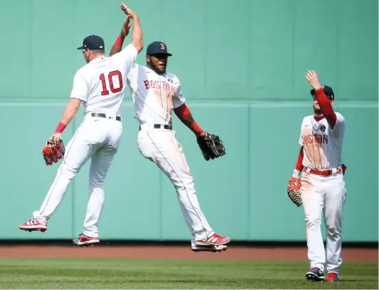  ?? PHOTO AFP ?? Les Red Sox de Boston ont été sans pitié pour les White Sox de Chicago, hier après-midi, l’emportant par la marque de 11 à 4.