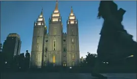  ?? Isaac Hale For The Times ?? THE LDS TEMPLE in Salt Lake City. The Mormon Church issued a warning to members that milkshake-style drinks still contain coffee and vaping is forbidden.