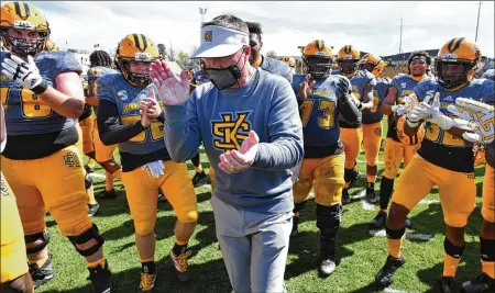  ?? HYOSUB SHIN/AJC 2021 ?? Kennesaw State, employing the very same option offense under head coach Brian Bohannon (above) that was expelled from Georgia Tech when Paul Johnson retired in 2018, has quickly become a power player in the second-level FCS (Bohannon is 53-16 there).