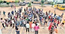  ??  ?? Migrant workers protest at Sriperumbu­dur Government High School