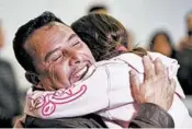  ??  ?? Fernando Arredondo sees his daughter Alison for the first time in 20 months at Los Angeles Internatio­nal Airport.