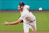  ?? Elise Amendola / Associated Press ?? Boston’s Chris Sale throws against Texas in the first inning at Fenway Park on Friday. Sale pitched five shut-out innings in his second start following Tommy John surgery.