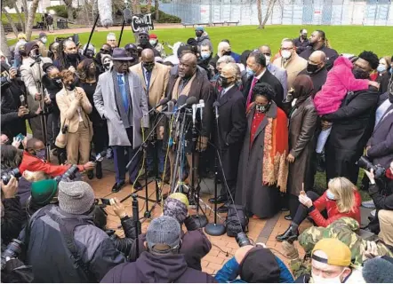  ?? JOSHUA RASHAAD MCFADDEN THE NEW YORK TIMES ?? Rodney Floyd, one of George Floyd’s brothers, speaks at a news conference and prayer vigil outside the Hennepin County Government Center in Minneapoli­s on Monday as closing arguments began in the trial of former Minneapoli­s police Officer Derek Chauvin.