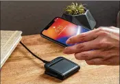  ?? TRIBUNE NEWS SERVICE ?? Mophie’s charge stream pad mini delivers 5w of wireless charging and is compatible with Apple, Samsung, and other Qi-enabled smartphone­s.