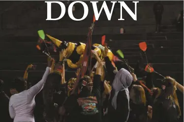  ??  ?? CHS Students celebrate their win over Rockmart by swatting at an effigy of Buzz the Yellow Jacket on Thursday after the 35-12 win.