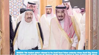  ?? —AFP and KUNA photos ?? MAKKAH: This handout picture released by the Saudi Royal Palace yesterday shows Saudi King Salman bin Abdulaziz and Kuwait’s Amir His Highness Sheikh Sabah Al-Ahmad Al-Jaber Al-Sabah (left) attending a meeting in Makkah to discuss the economic crisis...