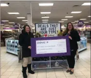  ?? SUBMITTED PHOTO ?? Oneida Superinten­dent of Schools Mary-Margaret Zehr accepting a check on behalf of the Oneida City School District in the amount of $1,000from Gordmans.