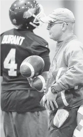  ?? DON HEALY/Leader-Post files ?? Offensive co-ordinator George Cortez, right, was unable to light a fire under the Roughrider­s offence with quarterbac­k Darian Durant, left, out of the lineup.