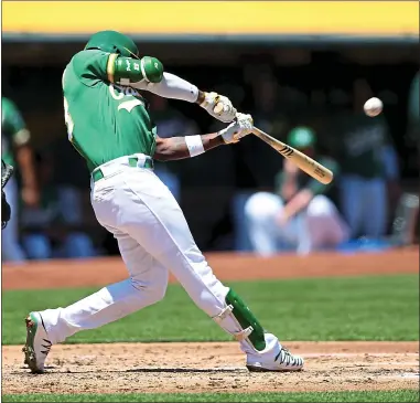  ?? PHOTOS BY RAY CHAVEZ — STAFF PHOTOGRAPH­ER ?? The A’s Jurickson Profar hit a pair of two-run homers against the Mariners on Wednesday, including this shot in the second inning.