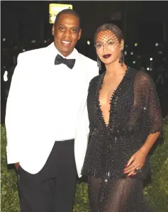  ??  ?? Beyonce and Jay-Z will lead an A-list lineup to mark 100 years since Nelson Mandela’s birth in a Johannesbu­rg festival by the Global Citizen movement to eradicate poverty.