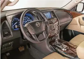  ??  ?? High-end features on the Armada include Nissan Navigation with NavTraffic and NavWeather and an 8-inch color display; heated and cooled front seats and a 13-speaker Bose audio system.