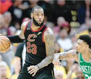  ??  ?? Cleveland Cavaliers’ Lebron James (23) drives to the basket against Boston Celtics’ Marcus Smart (36) during the fourth quarter in game four of the Eastern conference finals of the 2018 NBA Playoffs. — USA Today Sports