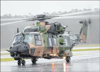  ?? Bradley Richardson
Australian Defence Force ?? An Australian Army MRH-90 Taipan helicopter from the School of Army Aviation prepares to take off in 2022 from Ballina airport in Ballina, Australia.