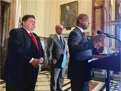  ?? JOHN O’CONNOR/AP PHOTO ?? Illinois House Speaker Emanuel “Chris” Welch, D-Hillside, briefs reporters on a budget deal reached among Democrats, including $1.8 billion in tax relief in part by freezing an automatic motor fuel tax increase.