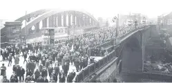  ?? ?? The old Wearmouth Bridge is used by a football crowd for the last time in April 1927. But the Antiquaria­ns can tell you much, much more about this photograph.