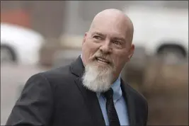  ?? MANUEL BALCE CENETA — THE ASSOCIATED PRESS FILE ?? Richard Barnett, an Arkansas man photograph­ed with his feet on a desk in former House Speaker Nancy Pelosi's office during the Jan. 6U.S. Capitol riot, arrives at federal court in Washington on Jan. 10.