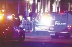  ?? ASSOCIATED PRESS ?? Fontana police, along with other law enforcemen­t agencies, work Thursday on Sierra Avenue in Fontana following a protest over the death of George Floyd in Minnesota.